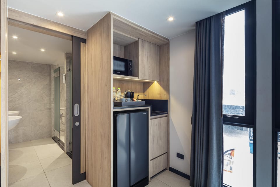 Deluxe Room, 1 King Bed, Non Smoking, Microwave (Dining Table) | Premium bedding, in-room safe, individually decorated