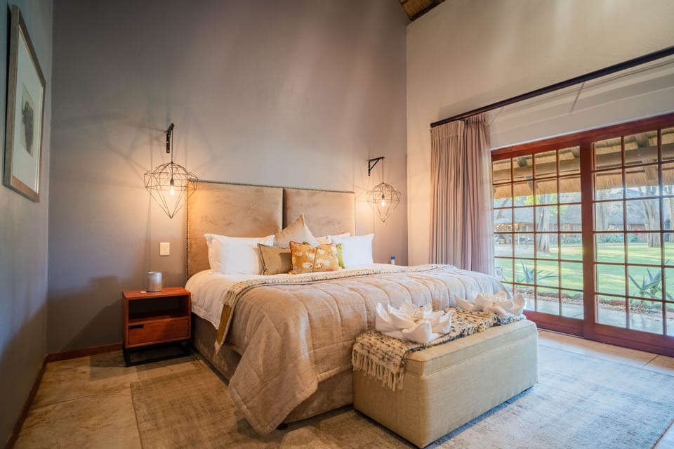 Superior Double Room | Minibar (free items), in-room safe, desk, blackout drapes