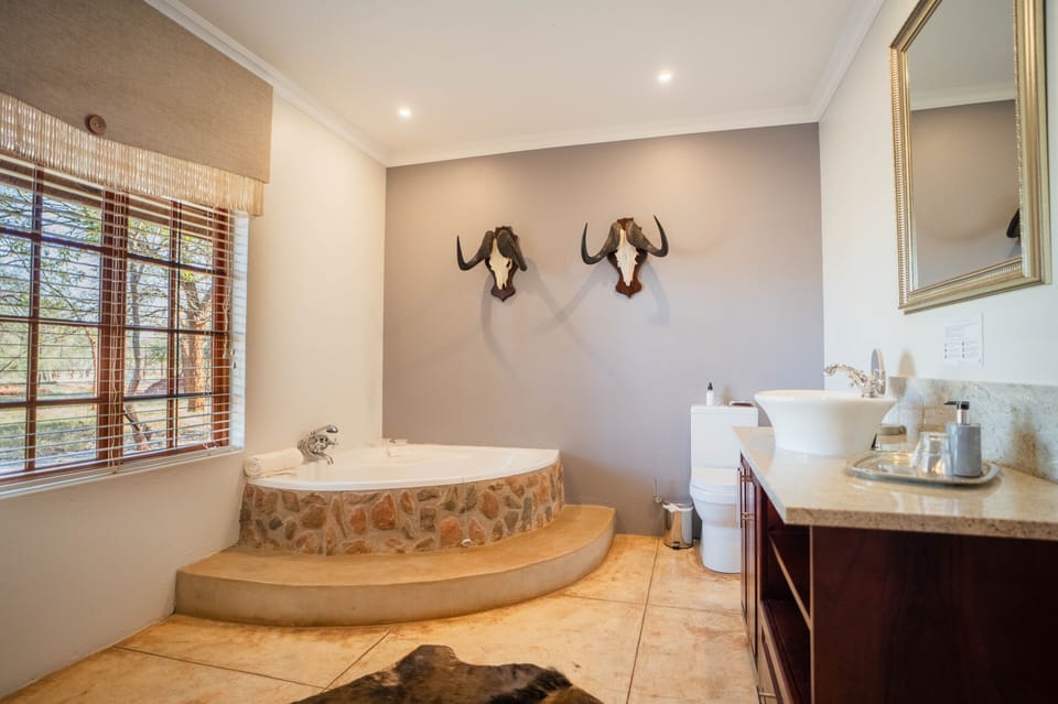 Superior Double Room | Bathroom | Deep soaking tub, free toiletries, hair dryer, bathrobes