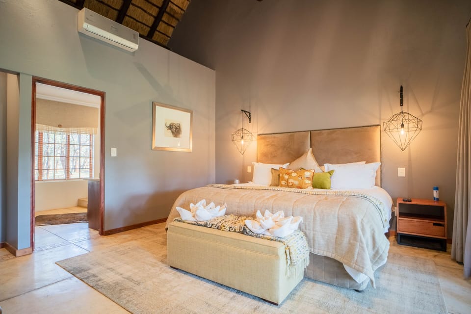 Superior Double Room | Minibar (free items), in-room safe, desk, blackout drapes