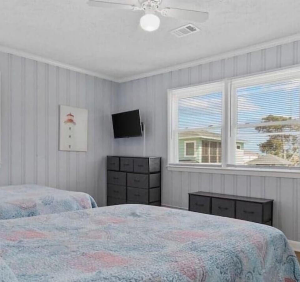 Indoor, climate control, Smart tv, two full size beds & access to full bath 