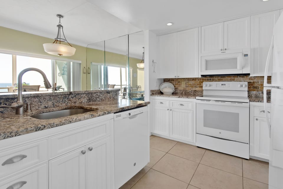 Open kitchen with granite counters