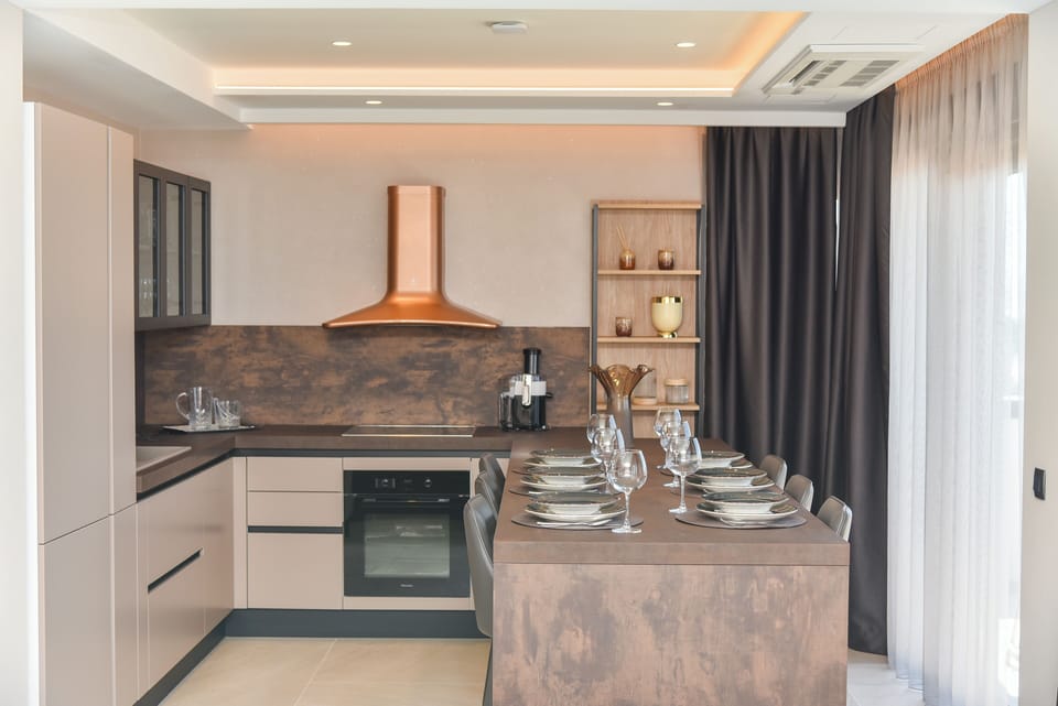 Exclusive Villa | Private kitchen | Stovetop, coffee/tea maker, electric kettle, highchair