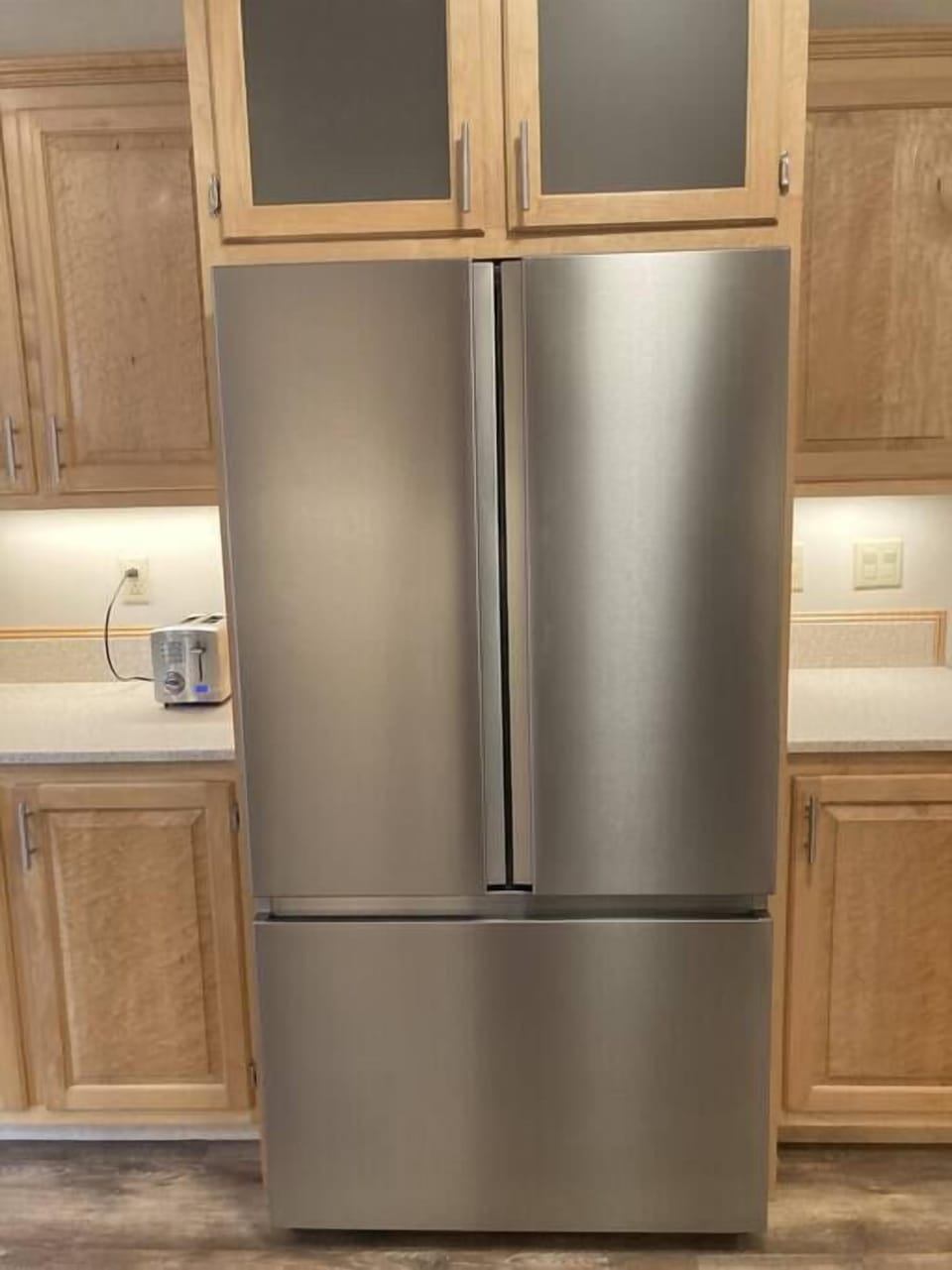 Sleek, stainless steel refrigerator