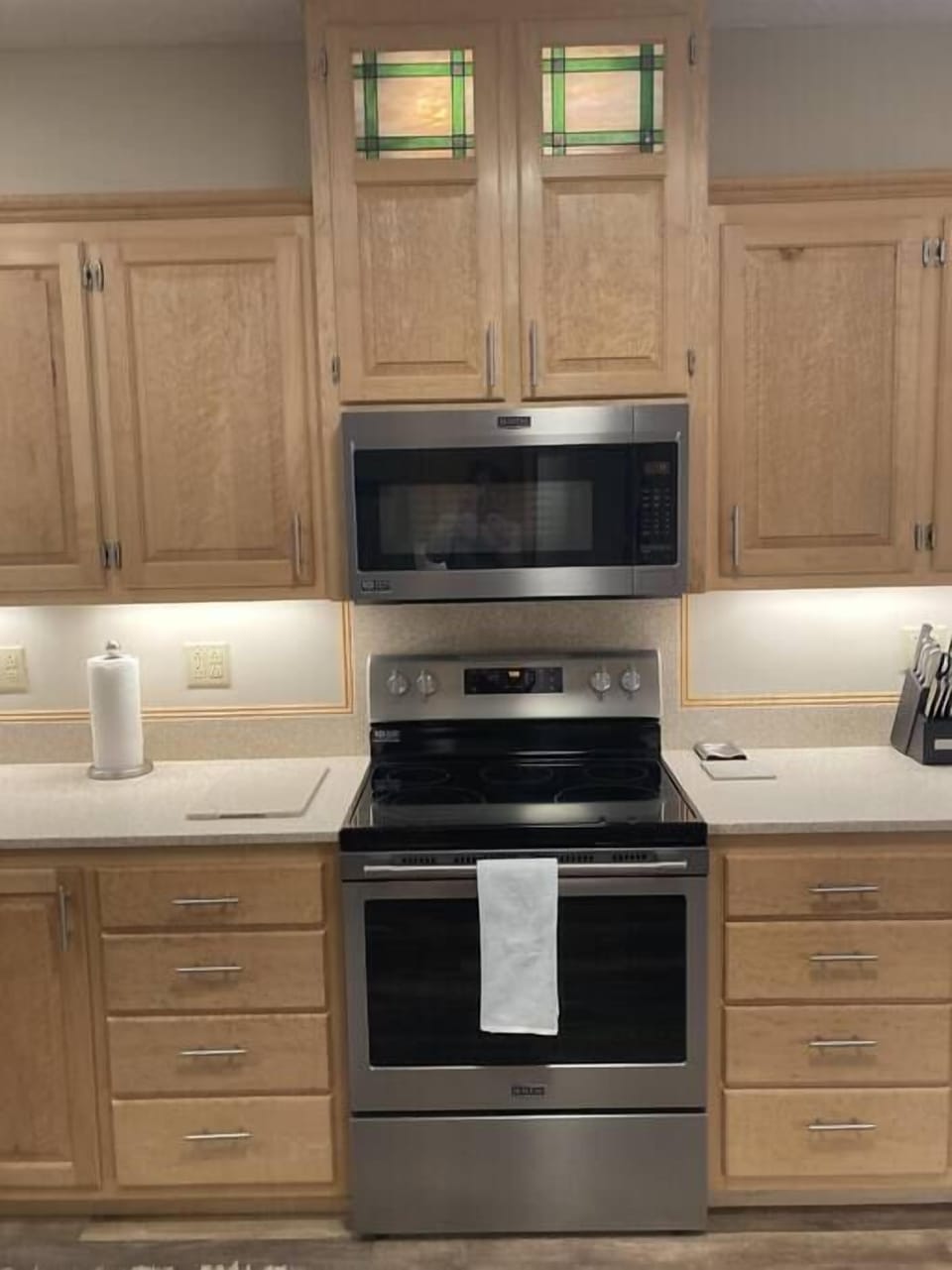 Glass stove cooktop and microwave oven