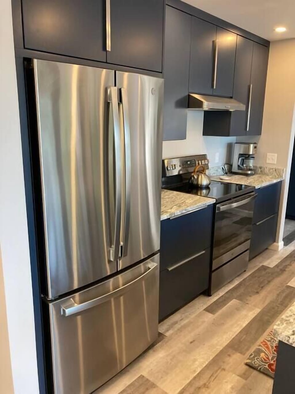 High end, stainless steel appliances throughout the cottage