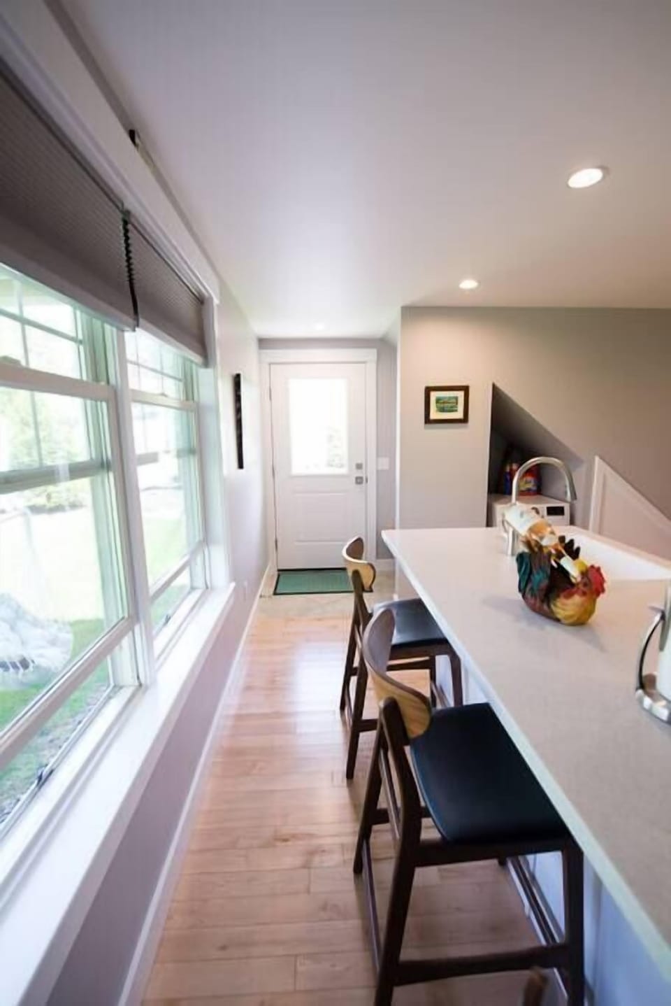 Kitchen area looking toward entryway