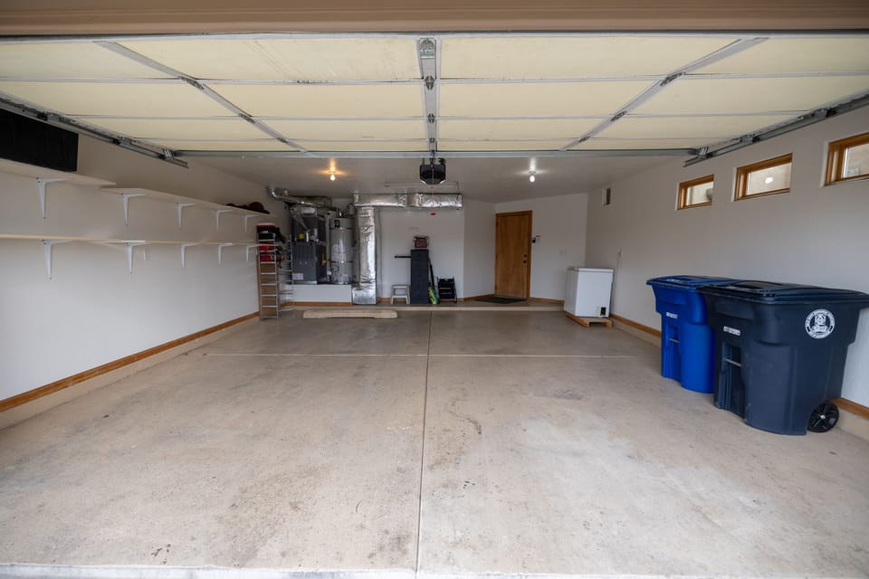 2 car garage. 2 driveway parking spaces. Street parking as well.