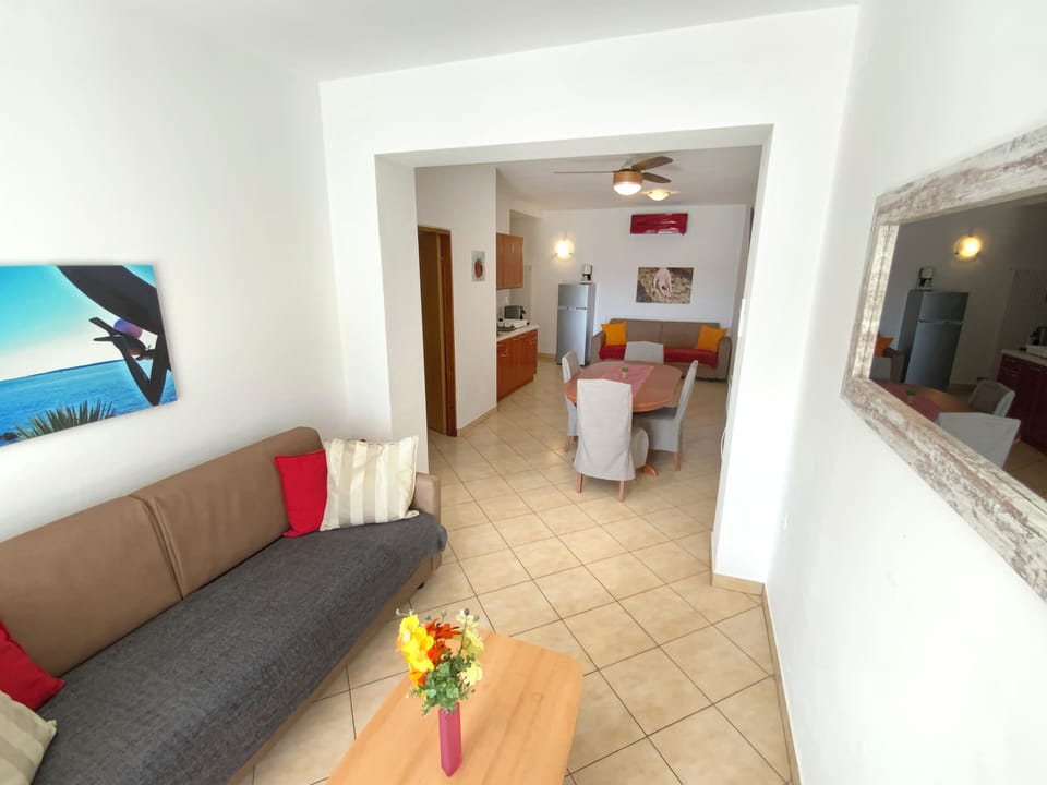 Apartment, Terrace, Sea View (2) | Living area | 35-inch flat-screen TV with satellite channels, TV
