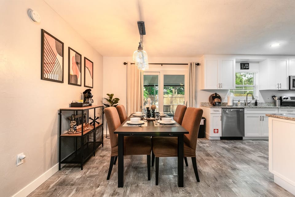 The coffee bar and dining table are located close to the kitchen for mingling!