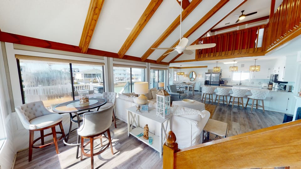Sun-filled and spacious with natural wood beams and relaxed coastal finishes—designed for effortless North Myrtle Beach living.