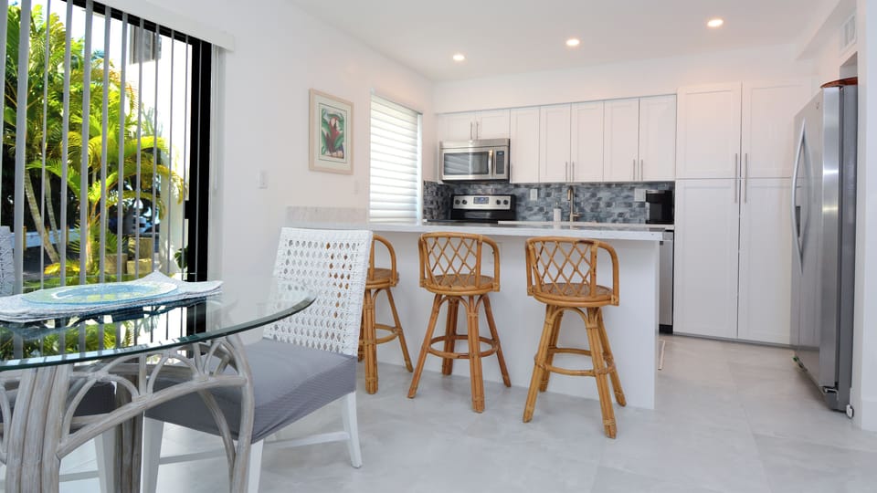 Dining Area, Breakfast Bar, and Kitchen - Ground Floor