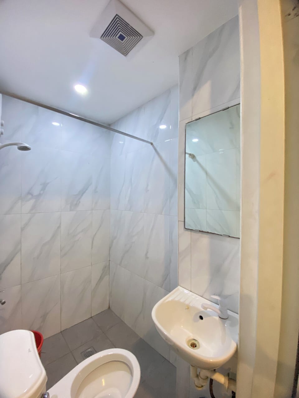 Shower, slippers, bidet, towels