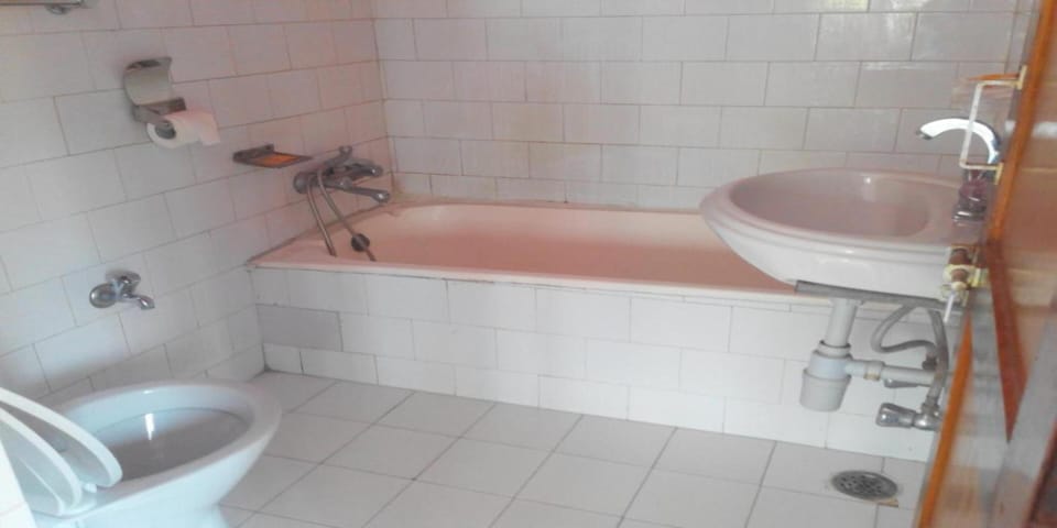 Shower, rainfall showerhead, towels, soap