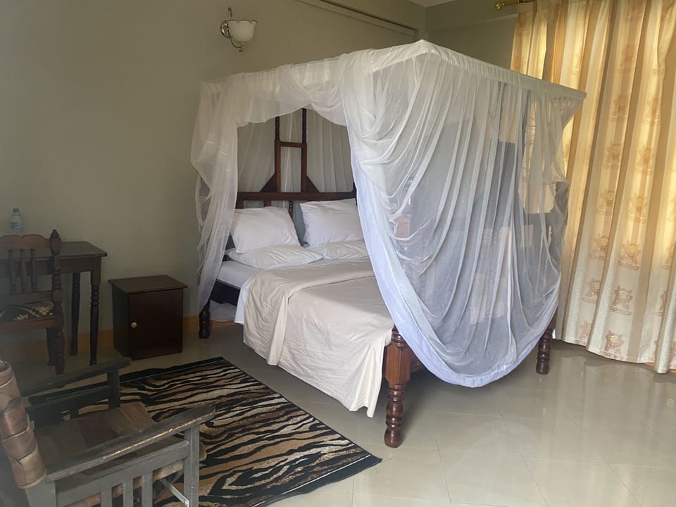 Desk, laptop workspace, free WiFi, bed sheets