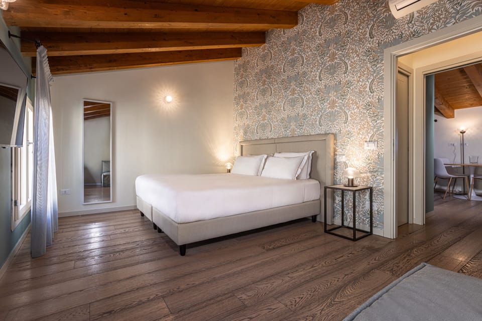 Deluxe Penthouse, Kitchenette, Canal View | 1 bedroom, desk, laptop workspace, iron/ironing board