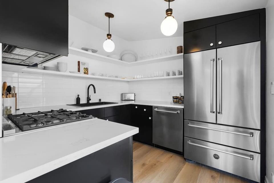 European style kitchen awaits you.  Fully stocked kitchen with all high-end appliances, dinnerware, flatware, drinkware, 2 coffee systems, and chef preferred gadgets for baking and cocktail making.