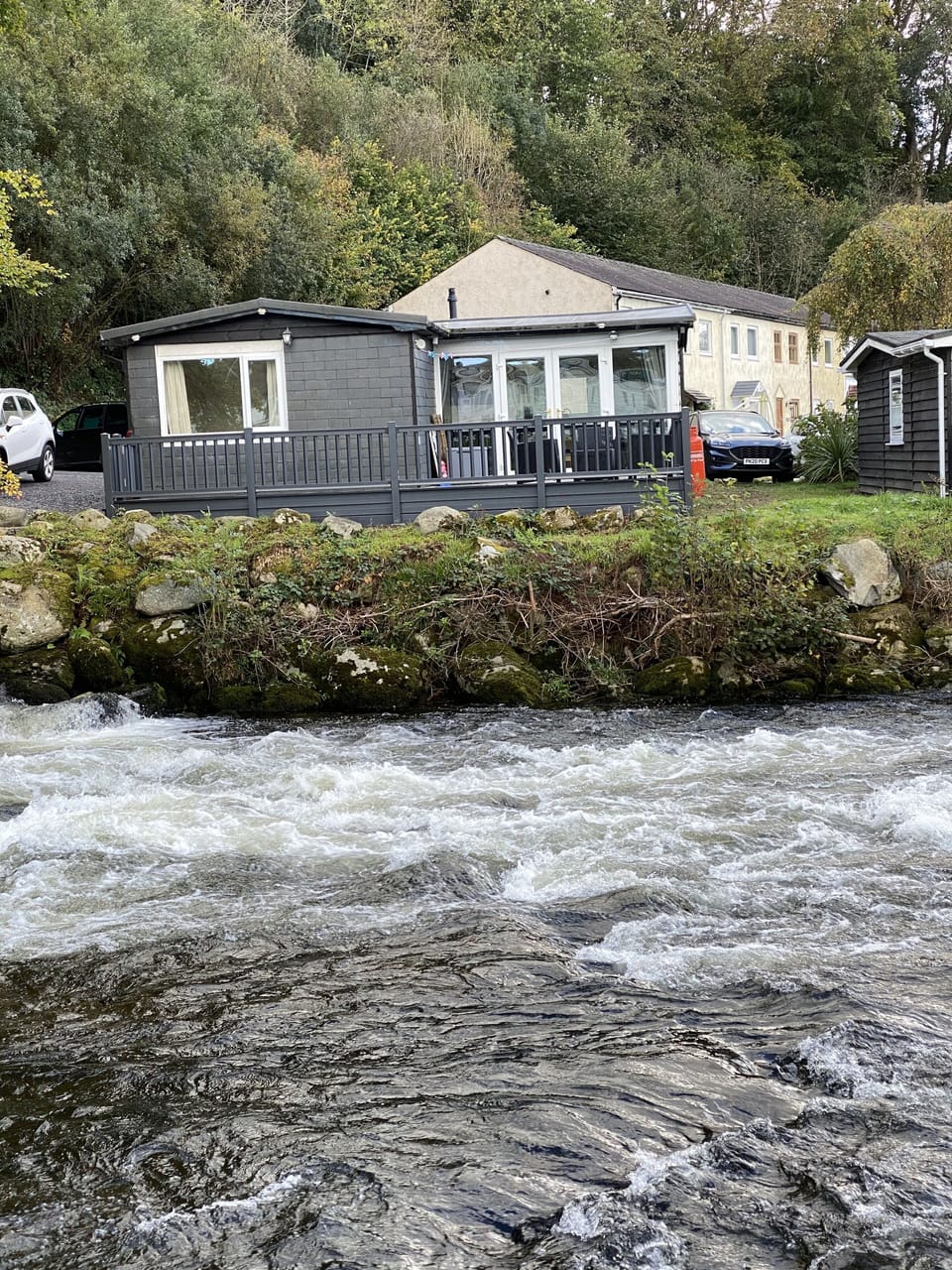 Cabin viewed from opposite side of the river