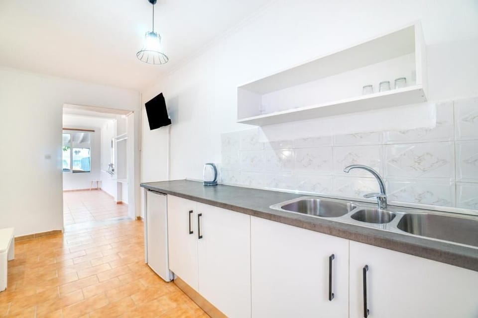 Apartment, Multiple Beds, Sea View, Ground Floor | Private kitchen | Fridge, coffee/tea maker, electric kettle, cookware/dishes/utensils