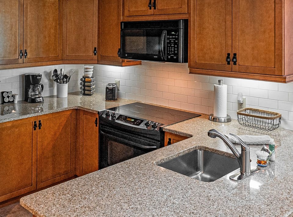 Full kitchen with a full size fridge