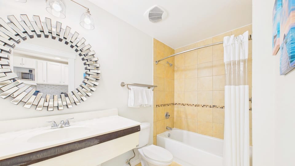 Full bathroom with shower and tub combo