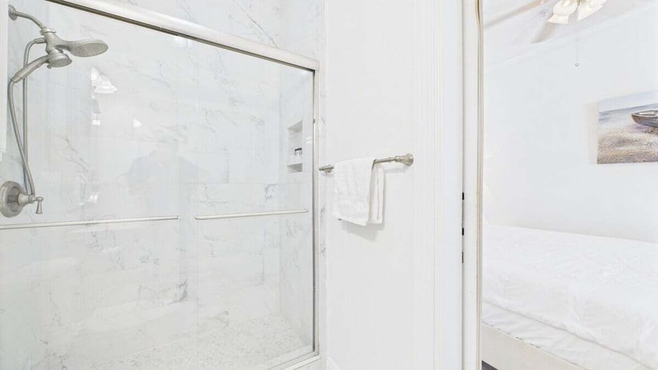 Bathroom with beautiful walk in shower and vanity