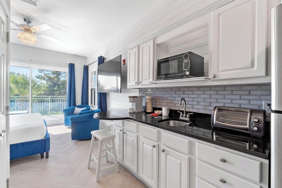 Kitchenette with microwave and full size refrigerator