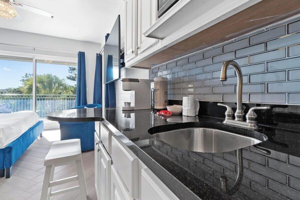 Kitchenette with microwave and full size refrigerator