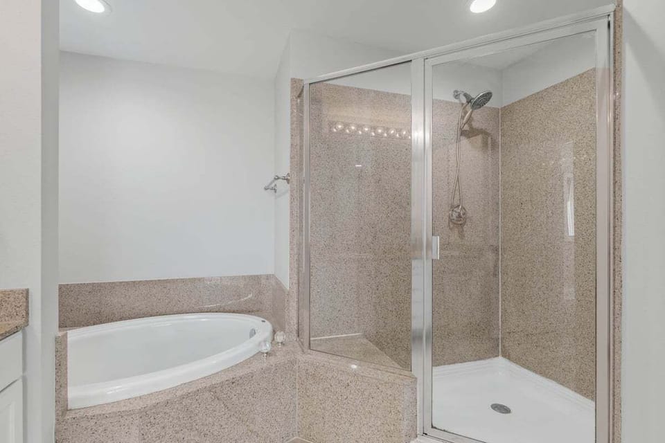 Shower and tub in main bathroom