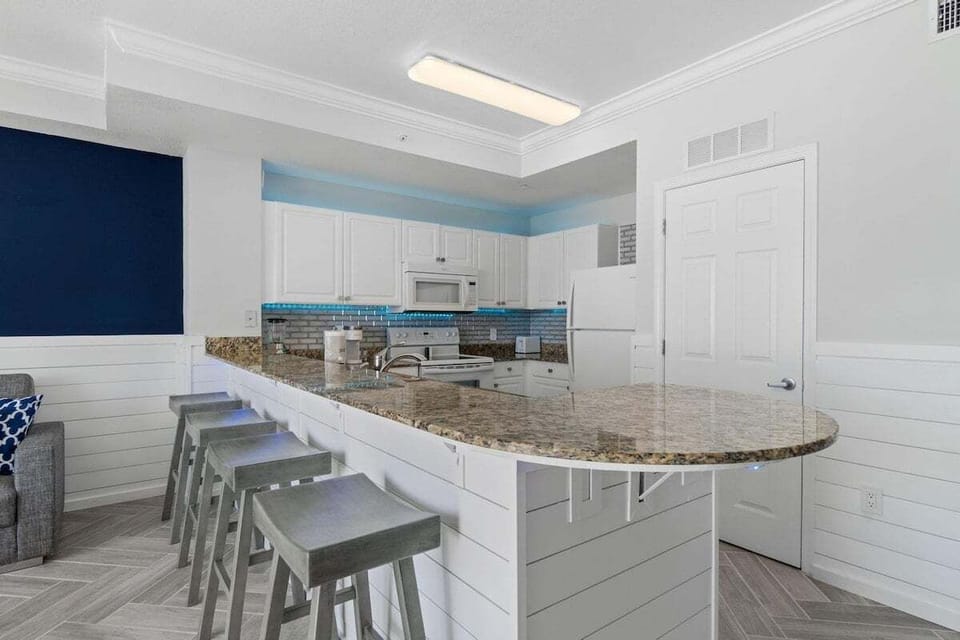 Kitchen area with bar seating