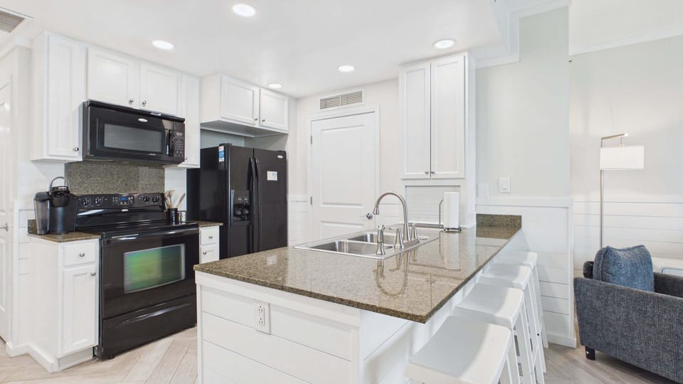 Fully applianced kitchen with ample counter space and all the cooking essentials