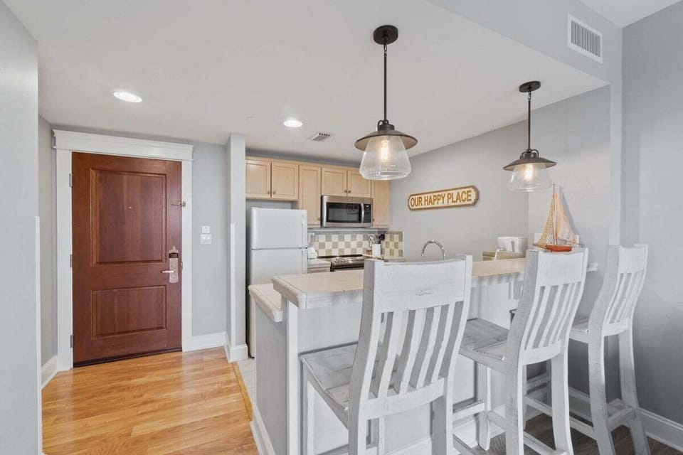 Kitchen area with bar seating