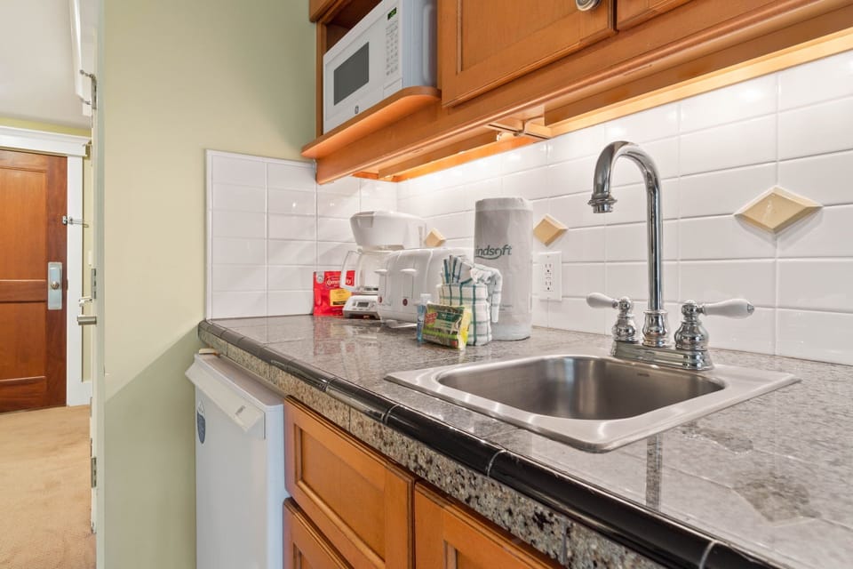 Kitchenette with coffee maker and toaster