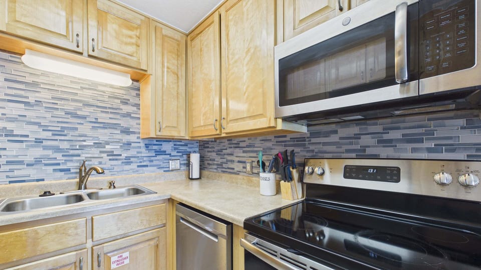 Full kitchen with NEW appliances and all the cooking essentials for your stay