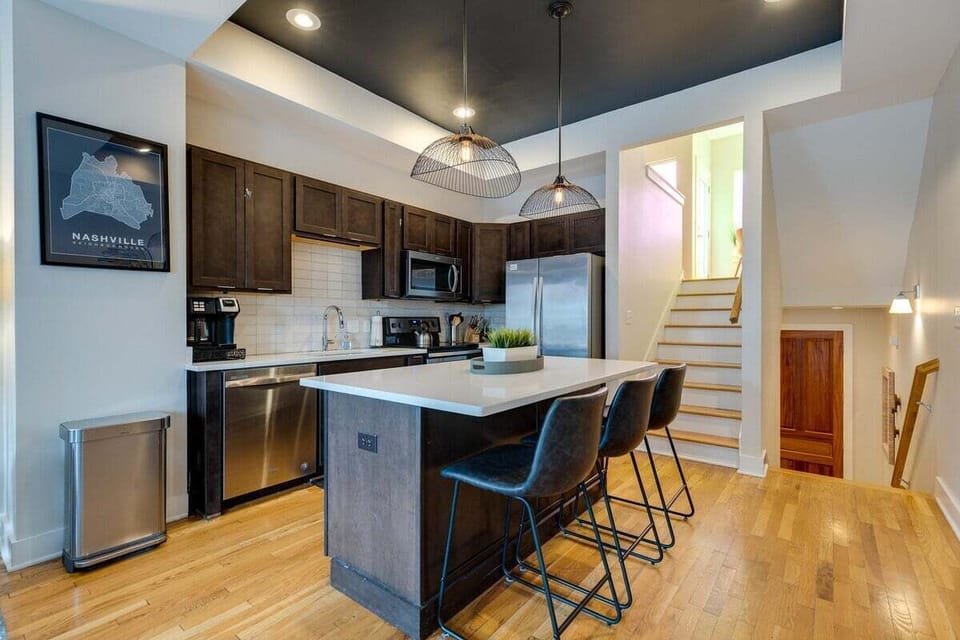 Full kitchen with all the cooking essentials + breakfast bar seating