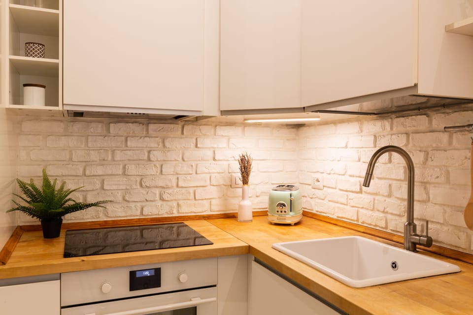Comfort Apartment | Private kitchen | Full-size fridge, oven, stovetop, dishwasher