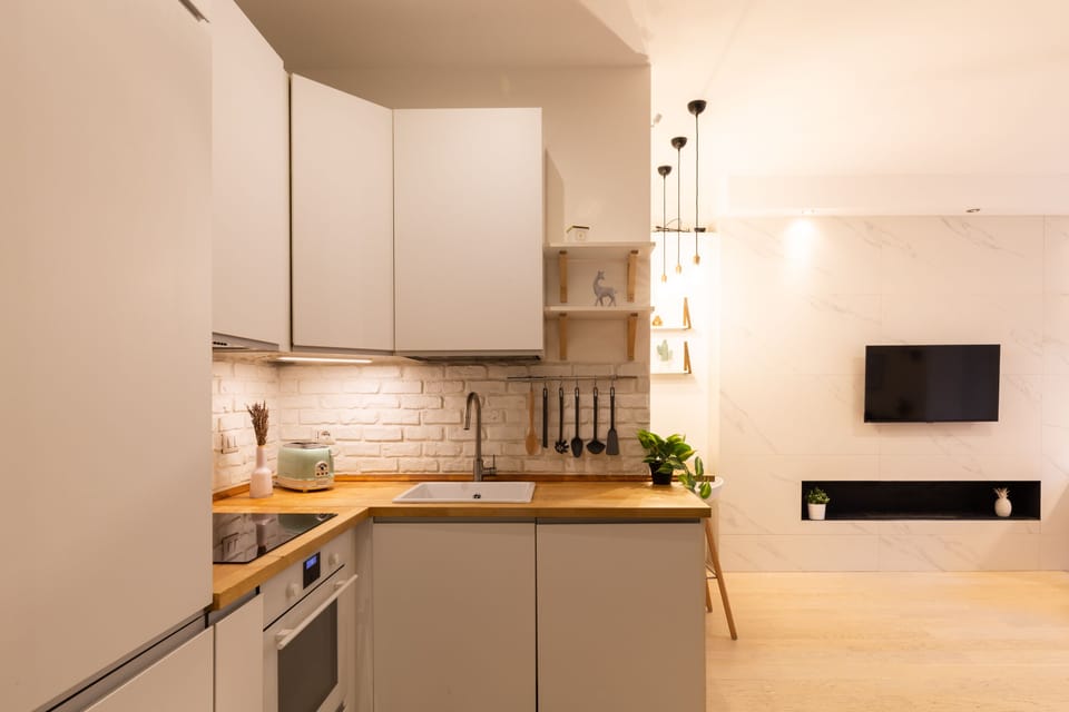 Comfort Apartment | Private kitchen | Full-size fridge, oven, stovetop, dishwasher