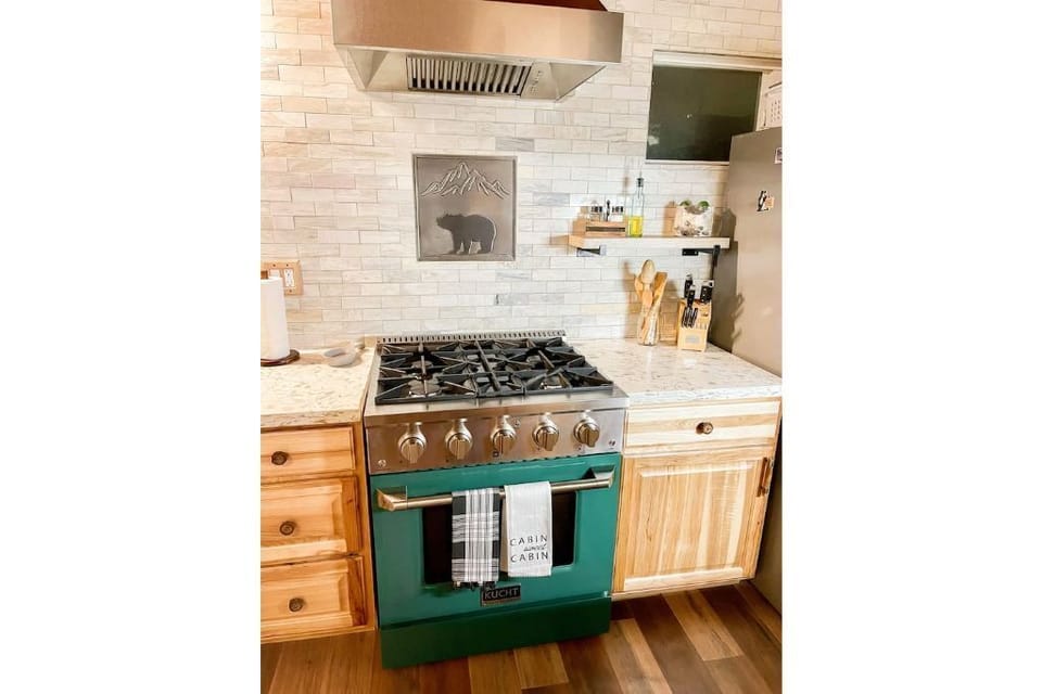 Upstairs kitchen with Kutch 4-burner stove and oven