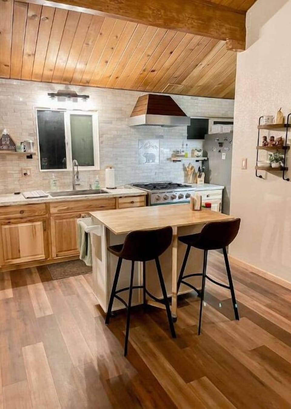 Kitchen with movable island and seating
