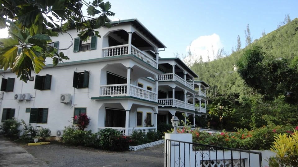 Well-maintained exterior, lush landscaping, quiet locale