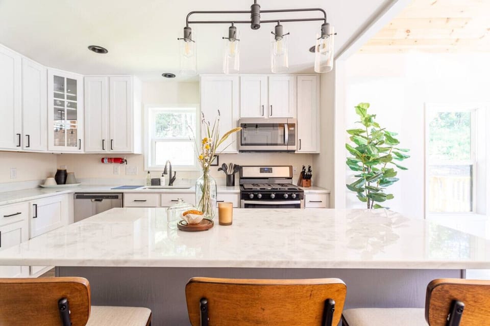 Modern, fully-equipped kitchen stocked with all the essentials and then some.