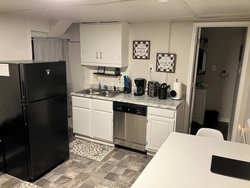 Experience the joy of sipping your morning coffee in the comfort of our inviting kitchen.