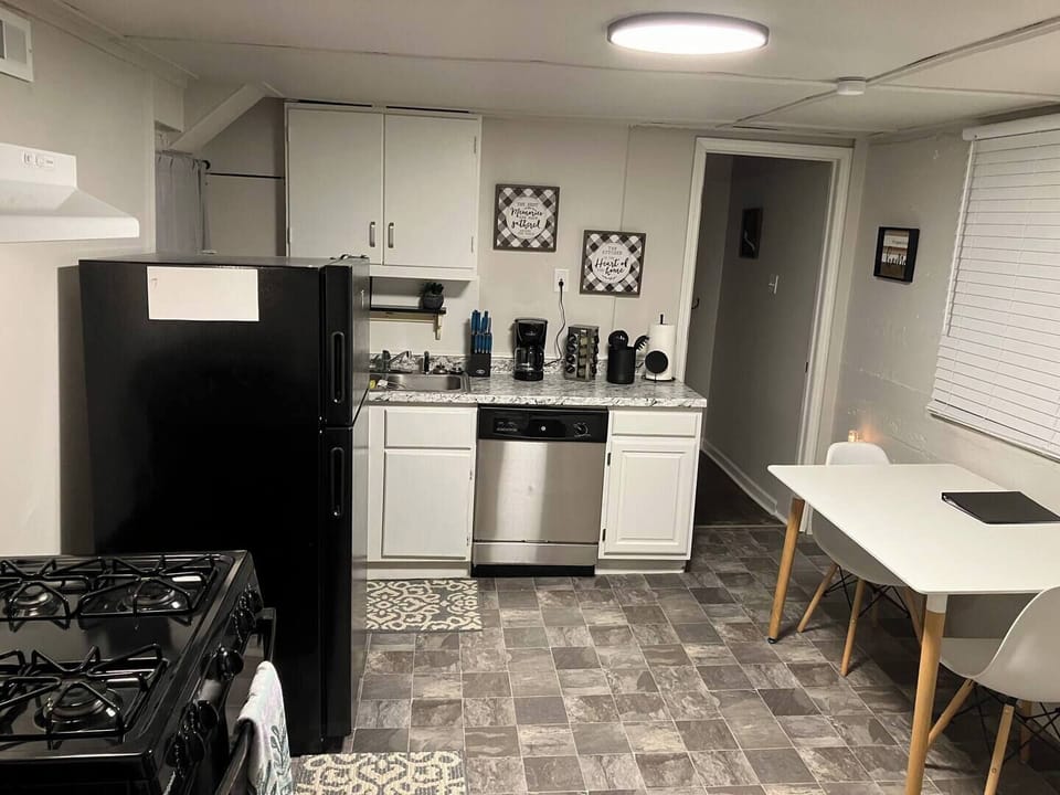 Make yourself at home in our well-equipped kitchen, perfect for dining in.