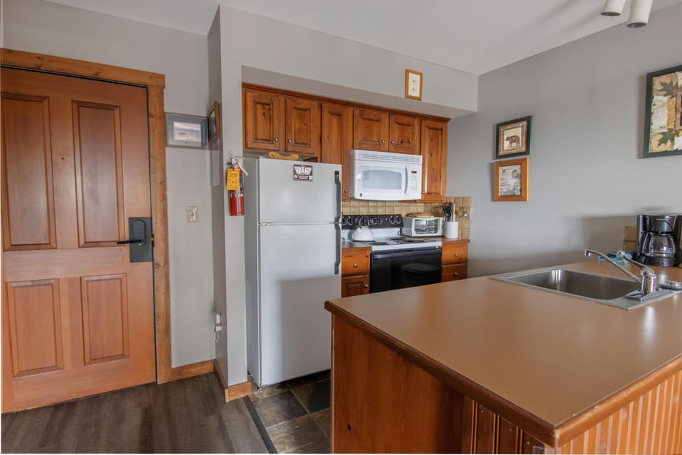 The fully equipped kitchen comes with everything you'll need to whip up tasty meals for your group!