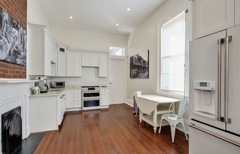 Spacious kitchen with stainless steel appliances. For cooking and entertainment.