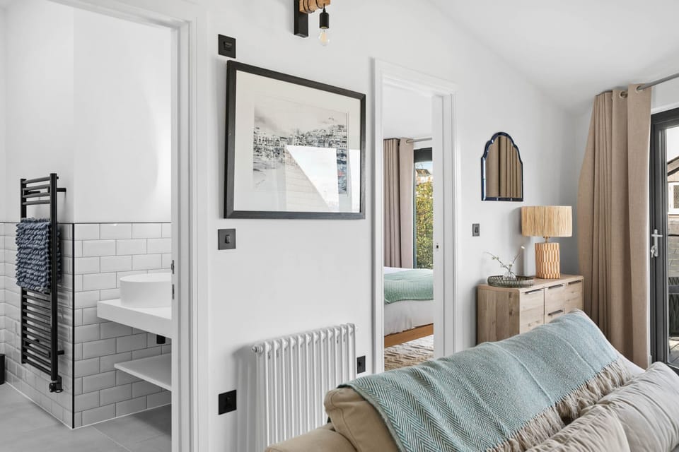 Bathroom and bedroom door from the living area - The Sail Loft Suite