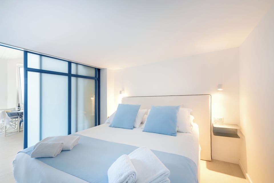 Family Apartment, Sea View, Split Level | Frette Italian sheets, premium bedding, down comforters, in-room safe