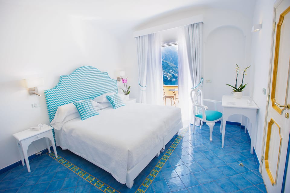 Deluxe Double or Twin Room, Terrace, Sea View | Frette Italian sheets, premium bedding, memory foam beds, minibar