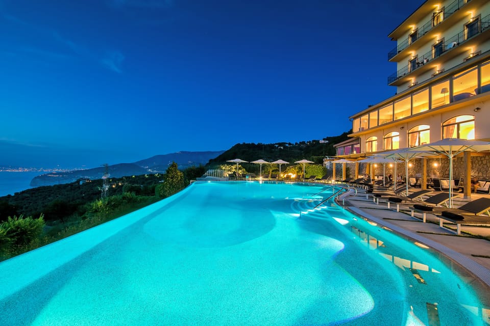 Outdoor pool, open 9:00 AM to 7:00 PM, pool umbrellas, sun loungers