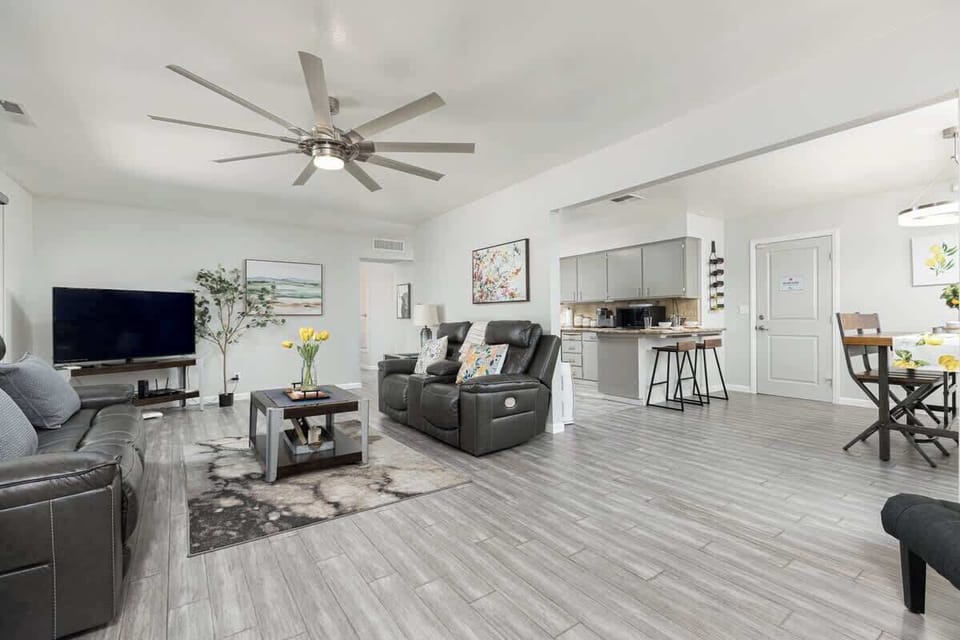 Living room and Smart TV, open to the dining and kitchen area